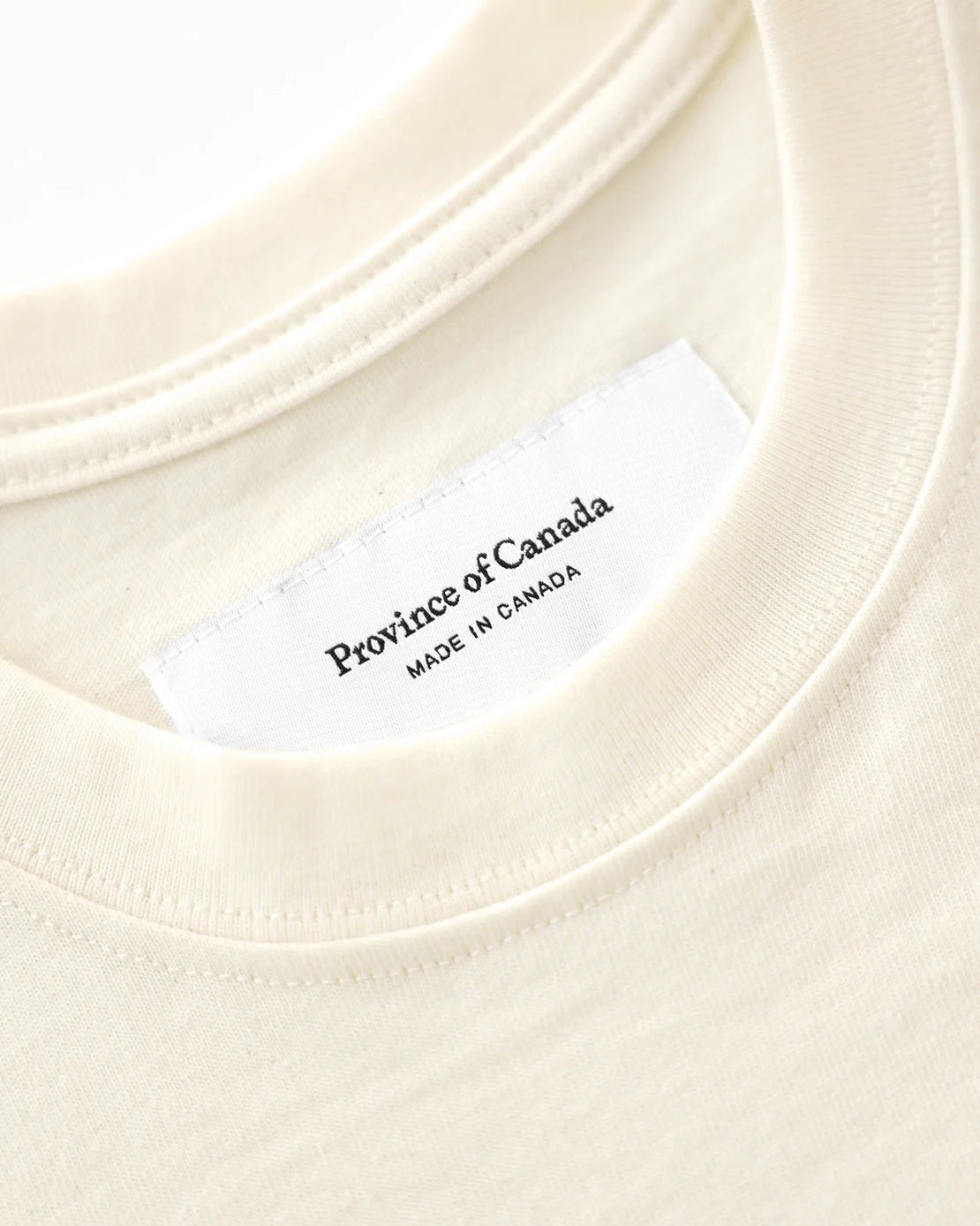 Jöey x Province of Canada Tee, close-up of the fabric label