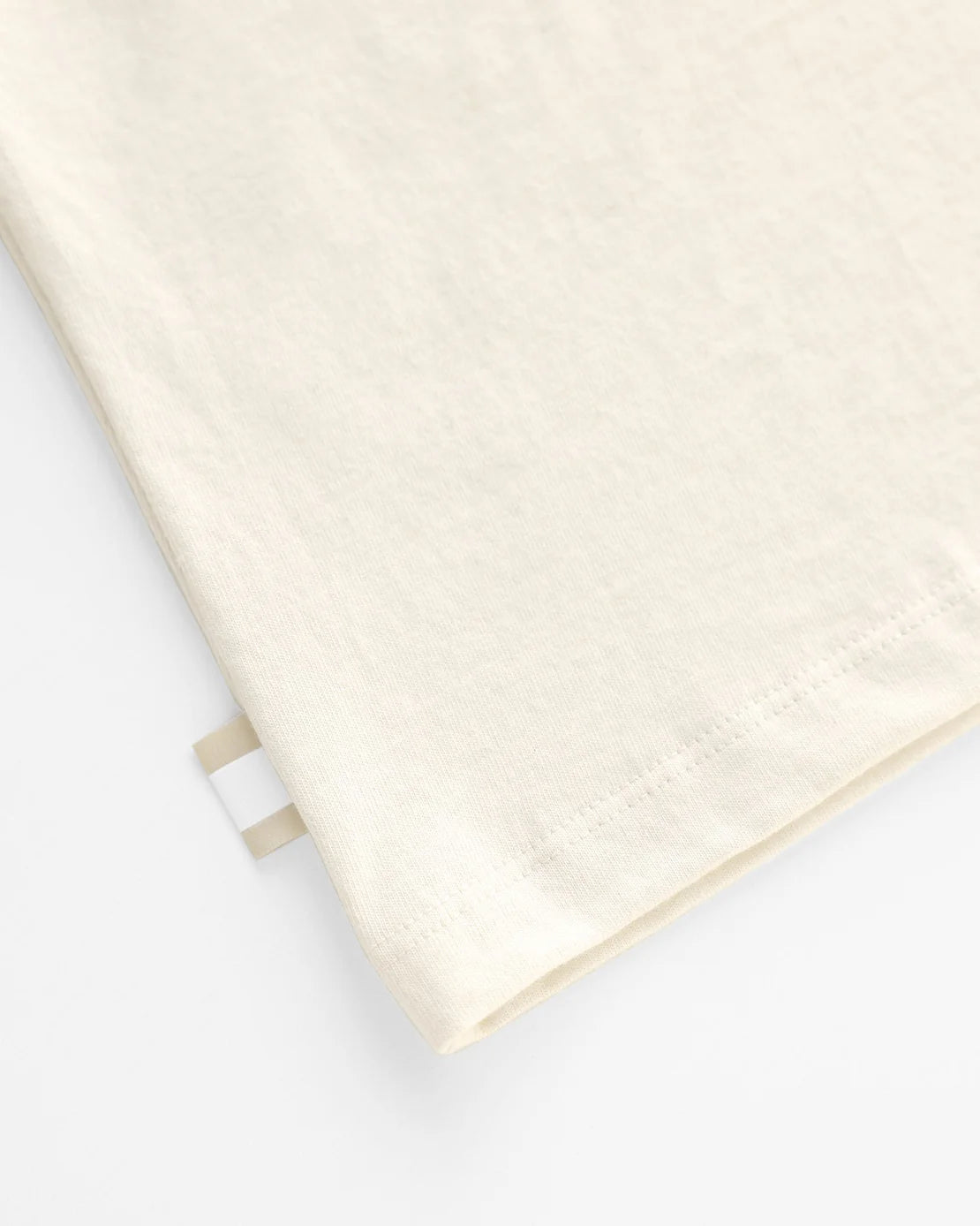 Jöey x Province of Canada Tee, close-up of the flag label detail